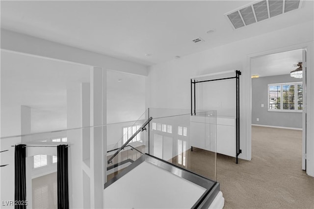 4604 Barnes Ct, Las Vegas, NV 89147 - corridor with carpet and a chandelier