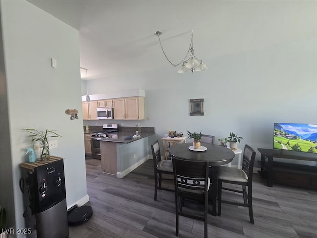 4764 Wild Draw Dr, North Las Vegas, NV 89031 - dining space with dark wood-style flooring and a chandelier