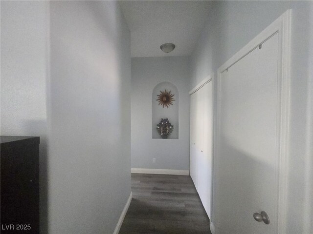 4764 Wild Draw Dr, North Las Vegas, NV 89031 - hallway with dark wood finished floors and baseboards