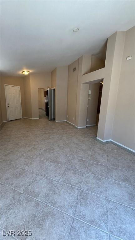 1081 Overture Dr, Las Vegas, NV 89123 - empty room featuring baseboards and light tile patterned floors