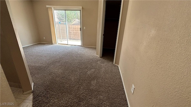 1081 Overture Dr, Las Vegas, NV 89123 - spare room featuring a textured wall and carpet flooring