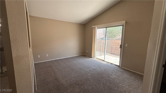 1081 Overture Dr, Las Vegas, NV 89123 - carpeted empty room with lofted ceiling and baseboards