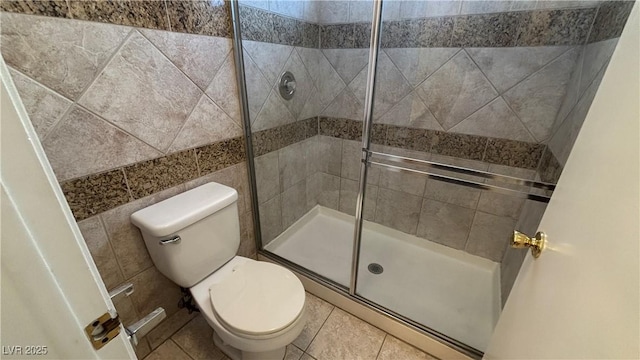 1081 Overture Dr, Las Vegas, NV 89123 - full bathroom with a stall shower, tile patterned flooring, and tile walls