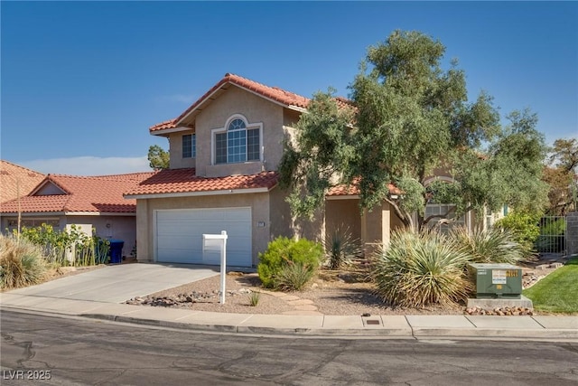 8771 Martinique Bay Ln, Las Vegas, NV 89147 - mediterranean / spanish house featuring stucco siding, a tile roof, driveway, and an attached garage