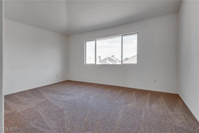 8771 Martinique Bay Ln, Las Vegas, NV 89147 - carpeted empty room with baseboards