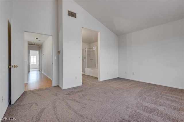 8771 Martinique Bay Ln, Las Vegas, NV 89147 - spare room with carpet and high vaulted ceiling