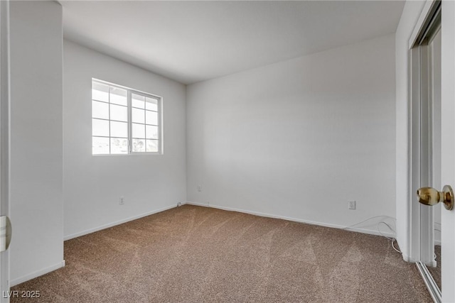 8771 Martinique Bay Ln, Las Vegas, NV 89147 - carpeted empty room with baseboards