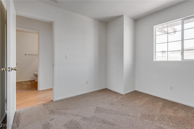 8771 Martinique Bay Ln, Las Vegas, NV 89147 - spare room featuring carpet and baseboards