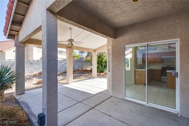 8771 Martinique Bay Ln, Las Vegas, NV 89147 - view of patio / terrace featuring a ceiling fan