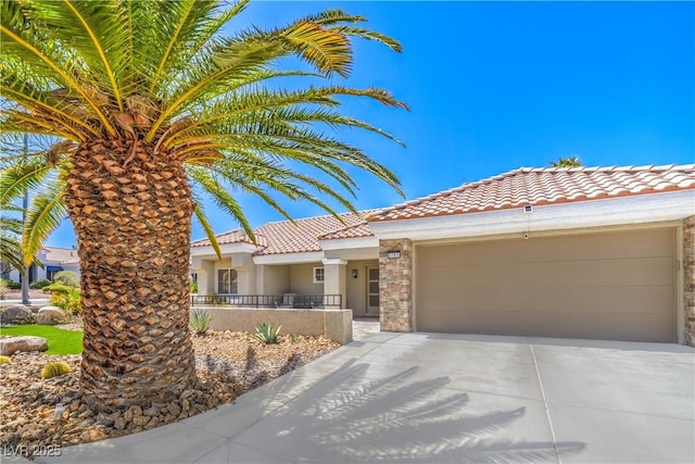 3101 Hayden Ct, Las Vegas, NV 89134 - mediterranean / spanish home featuring a tiled roof, stucco siding, driveway, and an attached garage