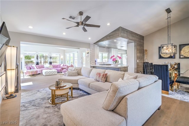 3101 Hayden Ct, Las Vegas, NV 89134 - living area with vaulted ceiling, ceiling fan, wood finished floors, and recessed lighting