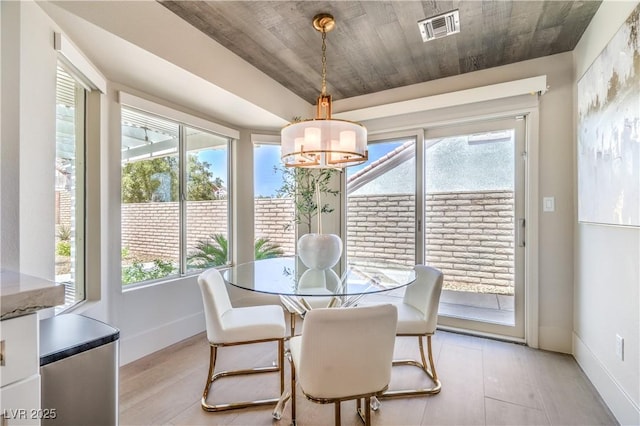 3101 Hayden Ct, Las Vegas, NV 89134 - dining space with plenty of natural light, a chandelier, and light wood-style flooring