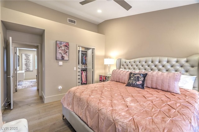 3101 Hayden Ct, Las Vegas, NV 89134 - bedroom featuring light wood-style floors, a spacious closet, recessed lighting, a closet, and a ceiling fan