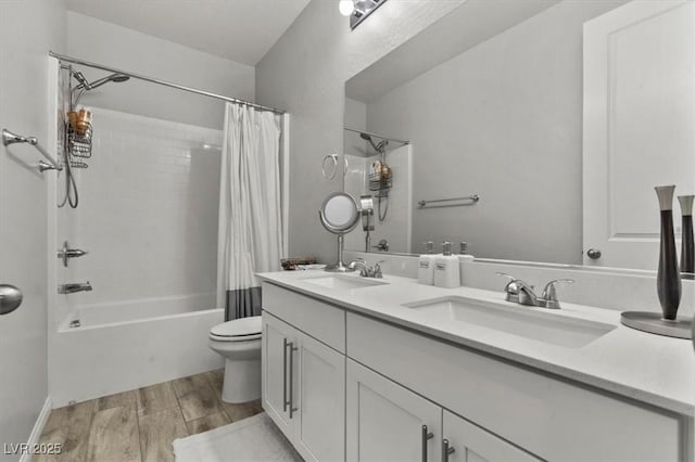 7456 Tinley Creek Ave, Las Vegas, NV 89113 - bathroom with shower / bath combo, wood finished floors, and double vanity