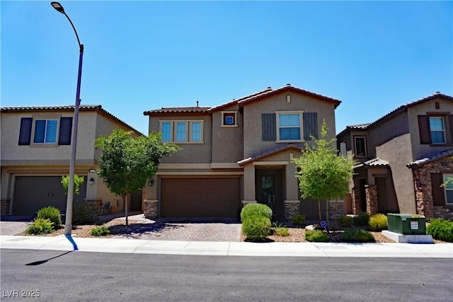 8131 Skye Plum St, Las Vegas, NV 89166 - view of front of home with stucco siding, a tile roof, stone siding, a garage, and driveway