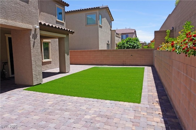 8131 Skye Plum St, Las Vegas, NV 89166 - fenced backyard featuring a patio area