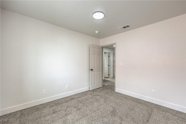 2107 Fountain Springs Dr, Henderson, NV 89074 - carpeted spare room featuring baseboards and a smoke detector
