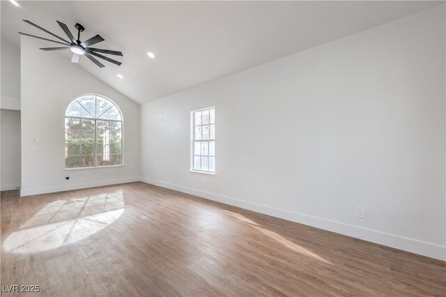 2107 Fountain Springs Dr, Henderson, NV 89074 - unfurnished room featuring healthy amount of natural light, wood finished floors, a ceiling fan, high vaulted ceiling, and recessed lighting