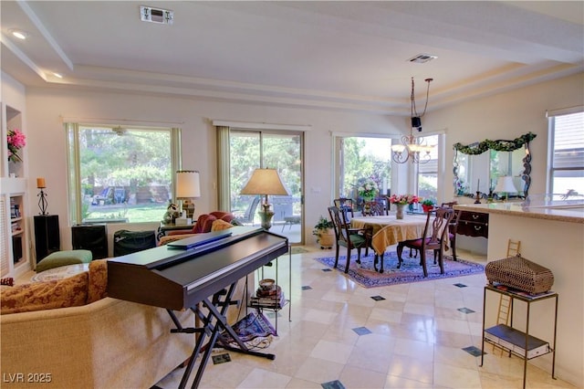 2026 Poppywood Ave, Henderson, NV 89012 - dining room featuring a tray ceiling, a chandelier, plenty of natural light, light tile patterned flooring, and recessed lighting