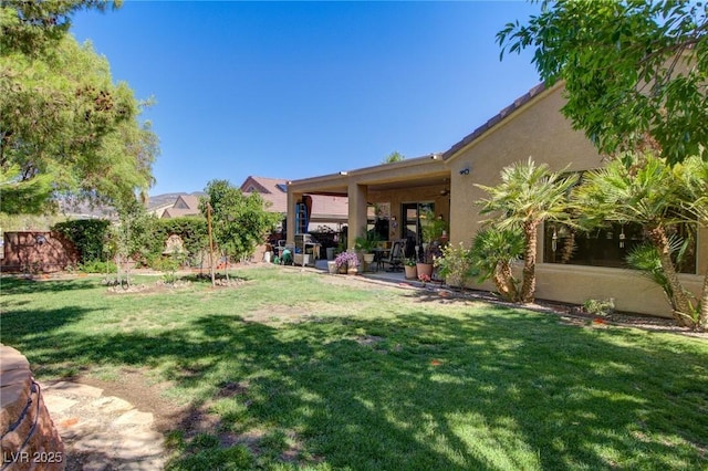 2026 Poppywood Ave, Henderson, NV 89012 - view of grassy yard with a patio area