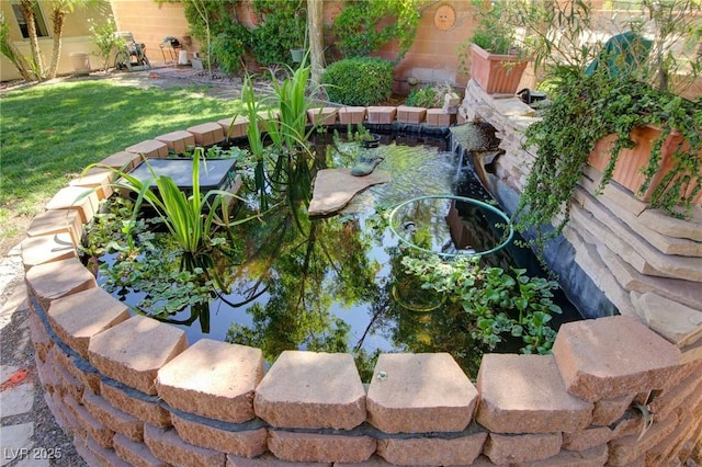 2026 Poppywood Ave, Henderson, NV 89012 - view of yard featuring a small pond