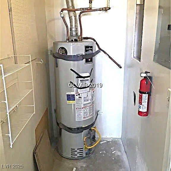 8417 Running Deer Ave Unit 101, Las Vegas, NV 89145 - utility room with secured water heater and electric panel