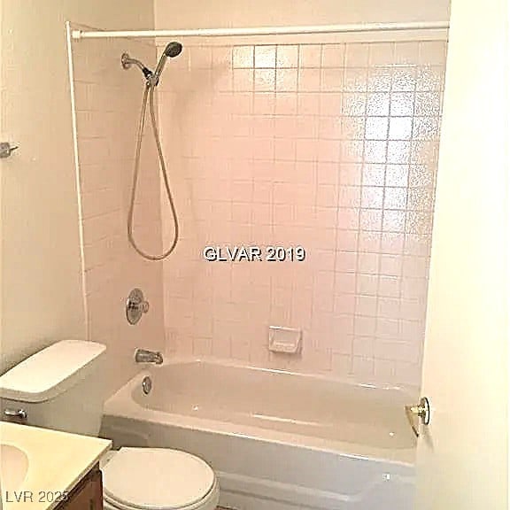 8417 Running Deer Ave Unit 101, Las Vegas, NV 89145 - bathroom with vanity and washtub / shower combination