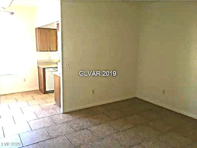 8417 Running Deer Ave Unit 101, Las Vegas, NV 89145 - empty room featuring light tile patterned flooring