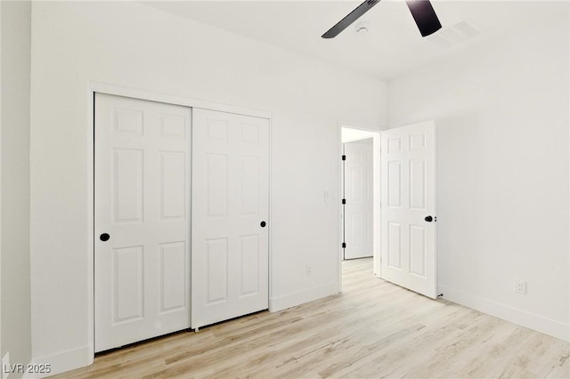 10302 Artful Stone Ave, Las Vegas, NV 89149 - unfurnished bedroom with light wood-type flooring, a closet, and ceiling fan