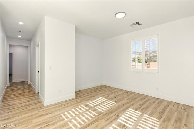 10302 Artful Stone Ave, Las Vegas, NV 89149 - spare room featuring wood finished floors and recessed lighting
