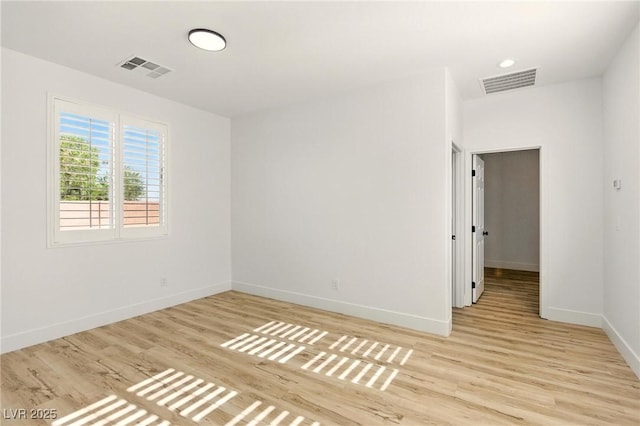 10302 Artful Stone Ave, Las Vegas, NV 89149 - unfurnished room featuring light wood-style flooring