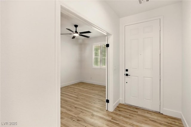 10302 Artful Stone Ave, Las Vegas, NV 89149 - foyer with light wood-style floors and ceiling fan