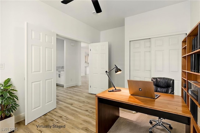 10302 Artful Stone Ave, Las Vegas, NV 89149 - office area featuring light wood-type flooring and a ceiling fan