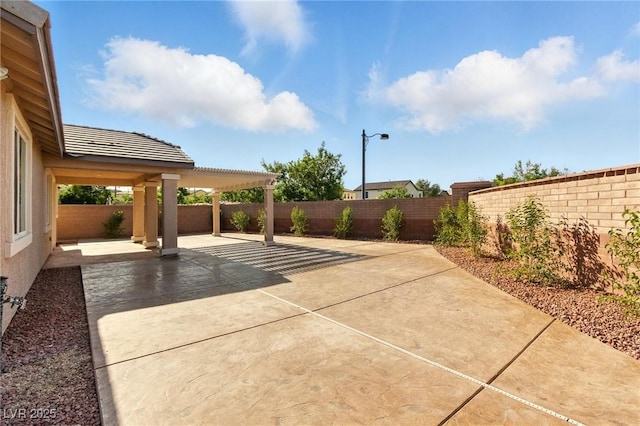 10302 Artful Stone Ave, Las Vegas, NV 89149 - fenced backyard featuring a patio