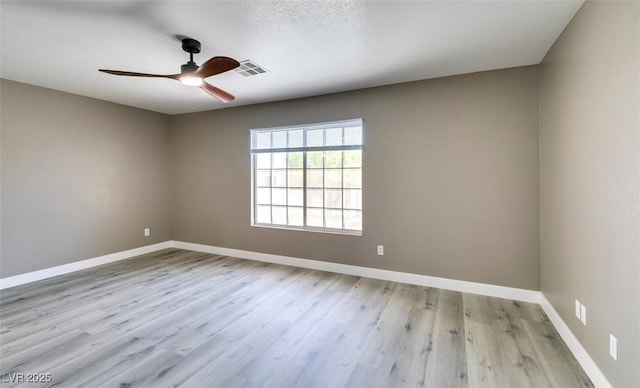 507 Satin Saddle Pl, Henderson, NV 89052 - unfurnished room featuring wood finished floors and ceiling fan