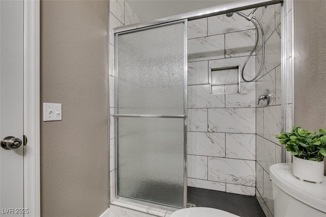 507 Satin Saddle Pl, Henderson, NV 89052 - bathroom with a shower stall and a textured wall