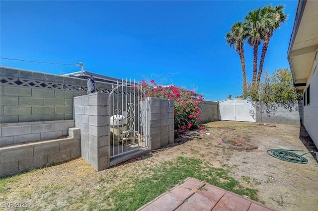 4807 Sacks Dr, Las Vegas, NV 89122 - fenced backyard with a gate
