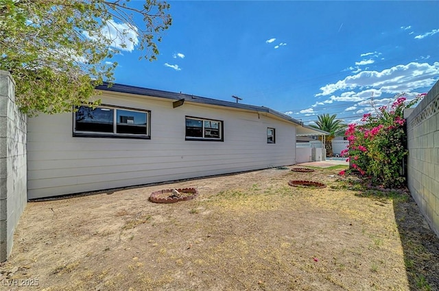 4807 Sacks Dr, Las Vegas, NV 89122 - rear view of house with a fenced backyard
