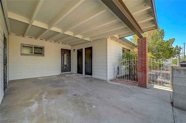 4807 Sacks Dr, Las Vegas, NV 89122 - view of patio featuring an attached carport