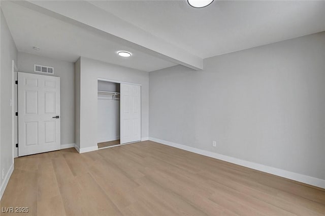 4807 Sacks Dr, Las Vegas, NV 89122 - unfurnished bedroom featuring light wood-style flooring and a closet