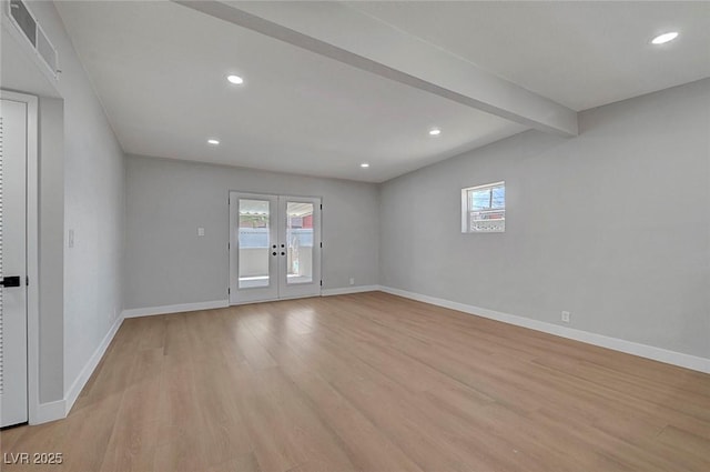 4807 Sacks Dr, Las Vegas, NV 89122 - spare room featuring light wood-style flooring, french doors, recessed lighting, and beamed ceiling