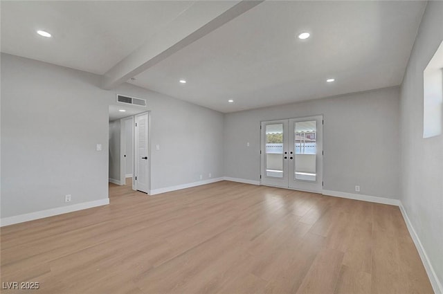 4807 Sacks Dr, Las Vegas, NV 89122 - unfurnished room featuring light wood-style flooring, beam ceiling, recessed lighting, and french doors