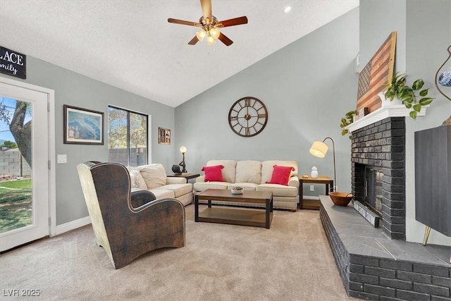 5008 Donnie Ave, Las Vegas, NV 89130 - living area featuring carpet, a fireplace, a ceiling fan, and high vaulted ceiling