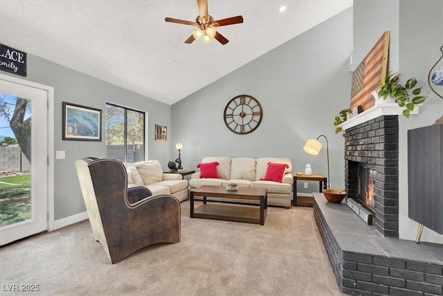 5008 Donnie Ave, Las Vegas, NV 89130 - living room featuring carpet floors, a brick fireplace, ceiling fan, and high vaulted ceiling