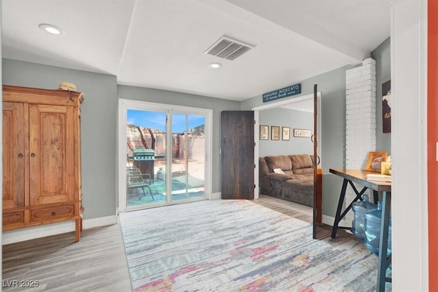 5008 Donnie Ave, Las Vegas, NV 89130 - bedroom with access to outside, light wood-style flooring, and recessed lighting