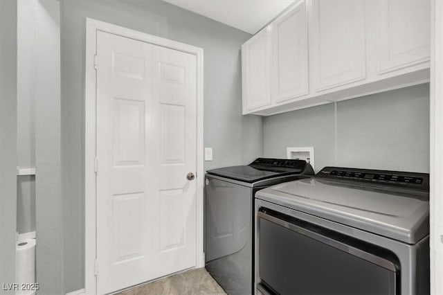 5008 Donnie Ave, Las Vegas, NV 89130 - washroom featuring washing machine and clothes dryer and cabinet space