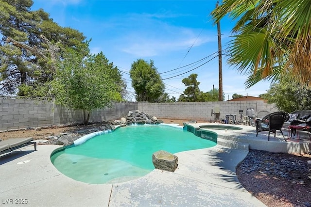 5008 Donnie Ave, Las Vegas, NV 89130 - view of swimming pool with a fenced backyard, a patio, and a pool with connected hot tub