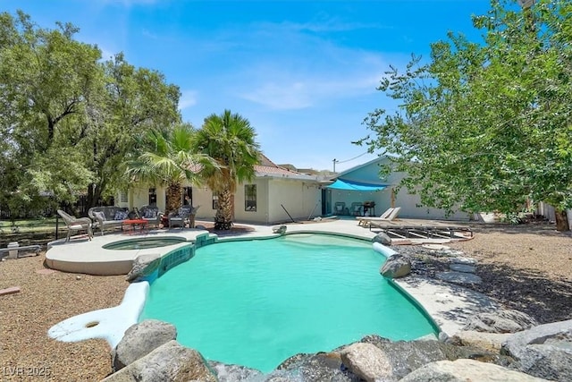 5008 Donnie Ave, Las Vegas, NV 89130 - view of swimming pool featuring a patio and a pool with connected hot tub