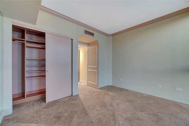 2877 Paradise Rd Unit 2105, Las Vegas, NV 89109 - unfurnished bedroom featuring crown molding and a closet