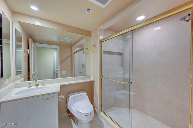 2877 Paradise Rd Unit 2105, Las Vegas, NV 89109 - full bathroom with a shower stall, vanity, recessed lighting, and tile patterned flooring